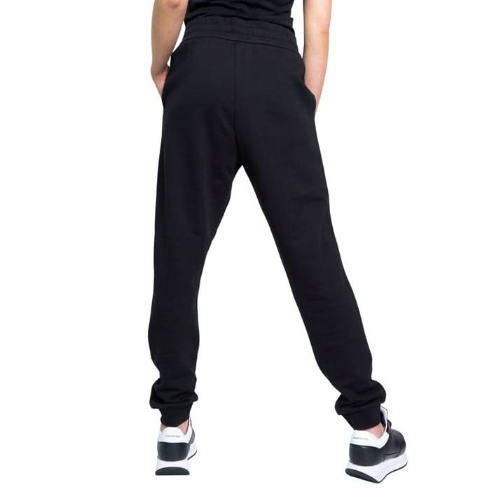 Step out in style with Armani Exchange black trousers featuring a modern print and lace-up detail. Ideal for a fashion-forward Spring/Summer wardrobe."

