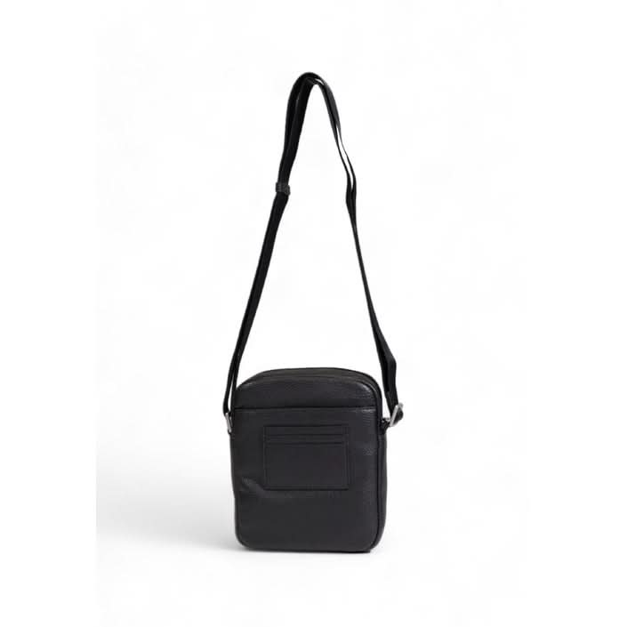 Sleek black Tommy Hilfiger shoulder bag, made from durable polyurethane.