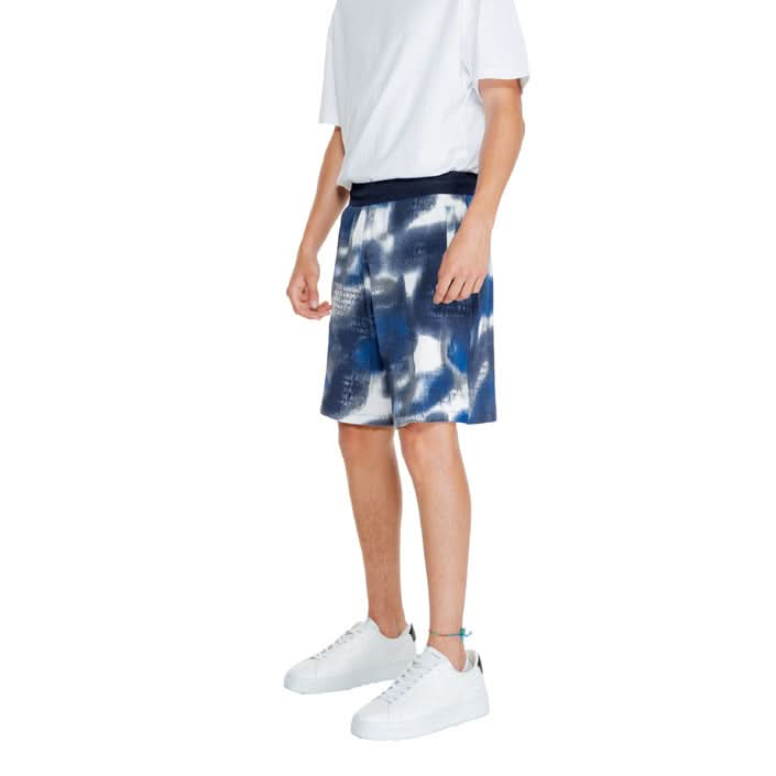 Side view of Armani Exchange blue printed shorts showing stylish print and relaxed fit ideal for Spring/Summer adventures.