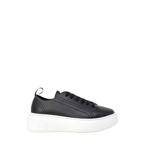 Close-up of Armani Exchange black leather sneakers for women, featuring a sleek plain pattern and leather lining.