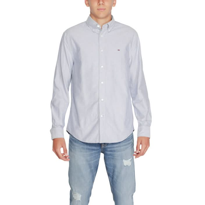 Tommy Hilfiger Men’s Blue Shirt with button fastening and classic collar, made from cotton and organic cotton.