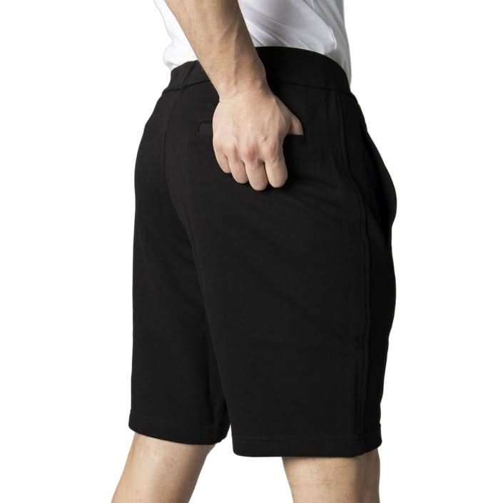 Luxurious black printed shorts by Armani Exchange for men, featuring a slip-on fastening and back pockets, made from 100% cotton for a sophisticated Spring/Summer look.