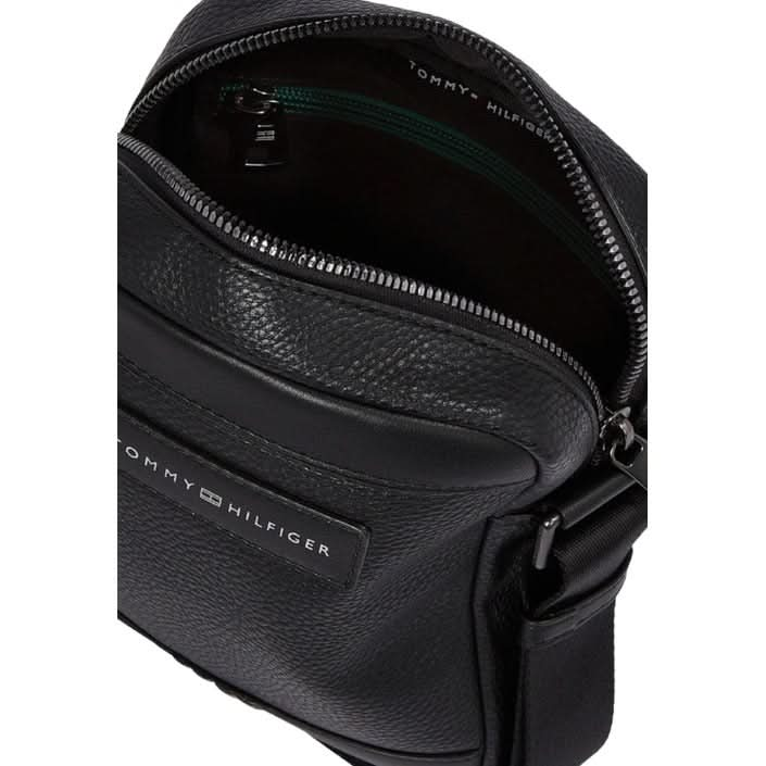 Sleek black Tommy Hilfiger shoulder bag made from 100% polyurethane.