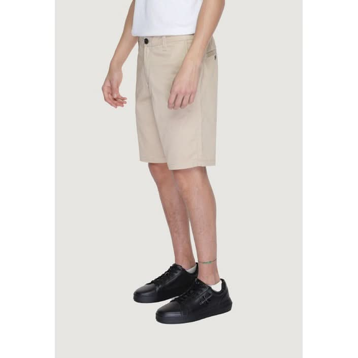 Side view of Armani Exchange beige shorts showing zip and button fastening, designed for a sophisticated yet casual look.