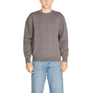 Armani Exchange black knit sweater with a chic checked pattern – designed for men, featuring long sleeves and a round neck for sophisticated Fall/Winter wear.