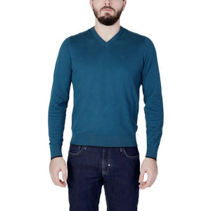 Armani Exchange green knitwear with V-neck – luxurious cashmere-cotton blend for fall/winter."
