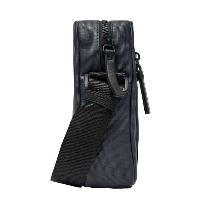 Compact blue Tommy Hilfiger shoulder bag, made from 100% polyurethane.