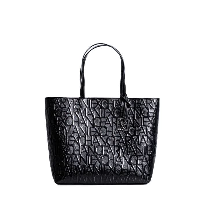 Armani Exchange Women’s Black Handbag in plain design, 100% polyurethane. Perfect for trendy metropolitan women this Fall/Winter. Available at Poshbro.