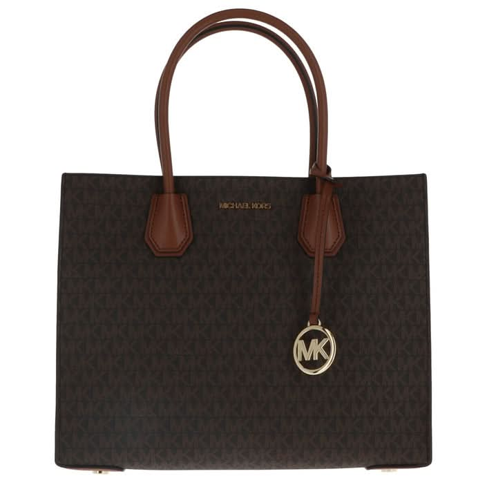 Michael Kors brown handbag with shoulder strap – stylish and practical for all seasons