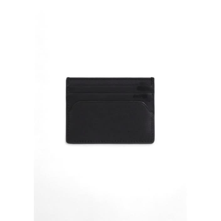 Classic black Tommy Hilfiger leather wallet, ideal for Fall/Winter wear.