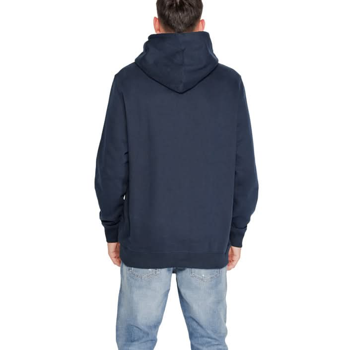 Classic blue Tommy Hilfiger sweatshirt, perfect for layering in Fall/Winter.