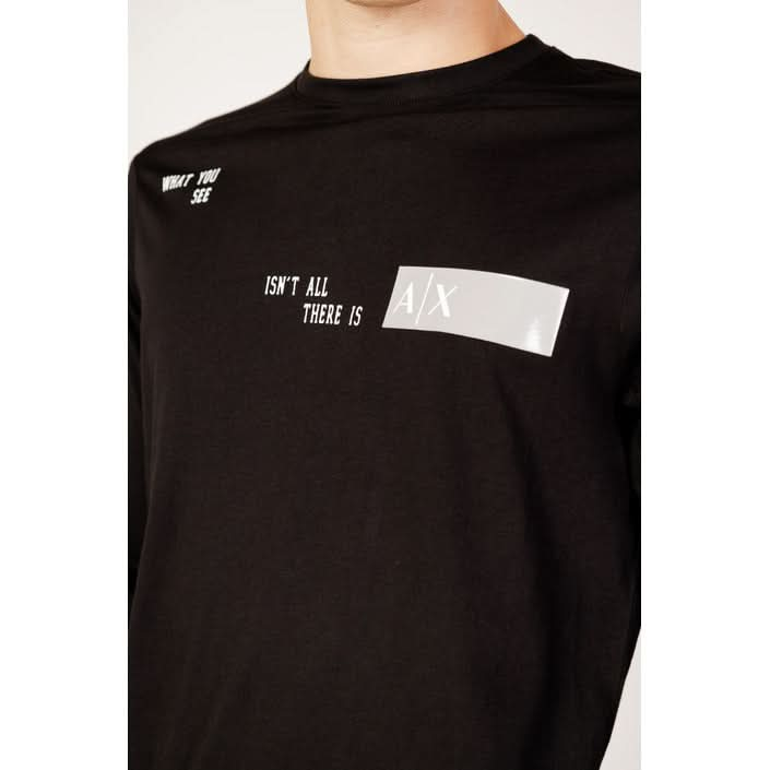 Want to be in the Armani circle of friends? Armani Exchange Black Printed T-shirt for men with round neck and long sleeves, crafted from 100% cotton.