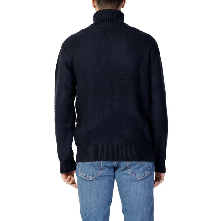 Elegant blue knitwear from Armani Exchange – turtleneck design with long sleeves, perfect for layering in Fall/Winter.