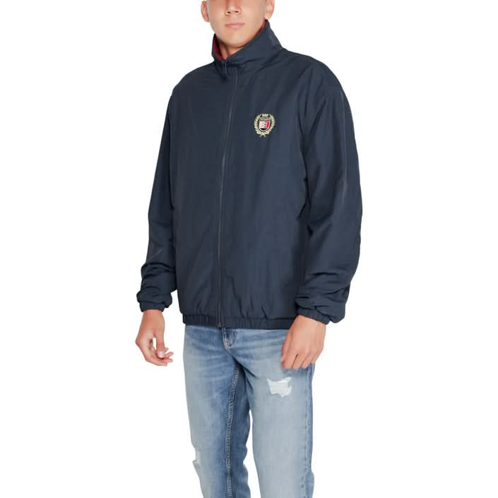 Tommy Hilfiger Men’s Blue Jacket with long sleeves and front pockets, perfect for casual and outdoor use.