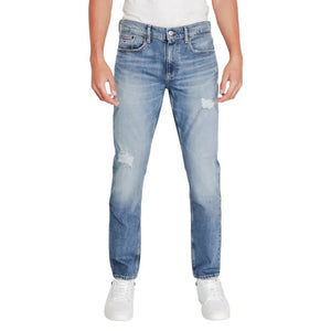 Tommy Hilfiger Men’s Blue Jeans with zip and button fastening, made from a cotton-lycra blend.