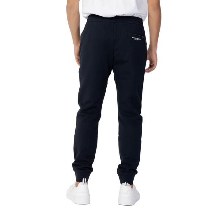 Armani Exchange blue trousers for men, showcasing a high-end design with front pockets and a stylish laced fastening.