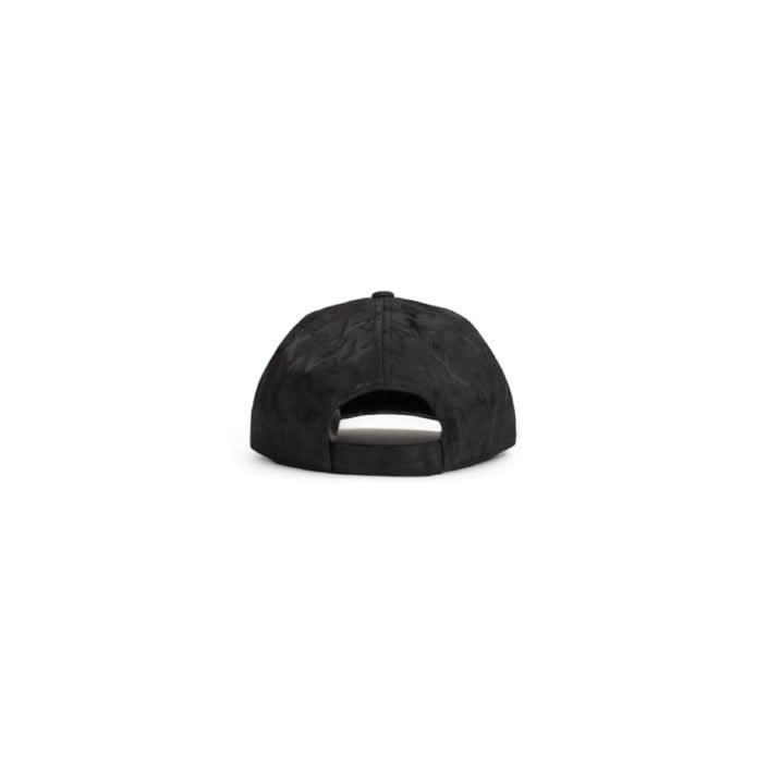 Make a statement at elite gatherings with the Armani Exchange Black Cap for Men. Designed for Fall/Winter, this cap features a clean design and adjustable buckle, perfect for networking in style.