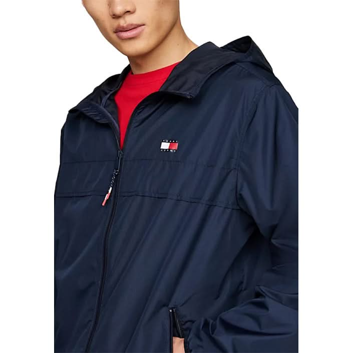 Stylish blue Tommy Hilfiger hooded jacket, perfect for Fall/Winter wear.